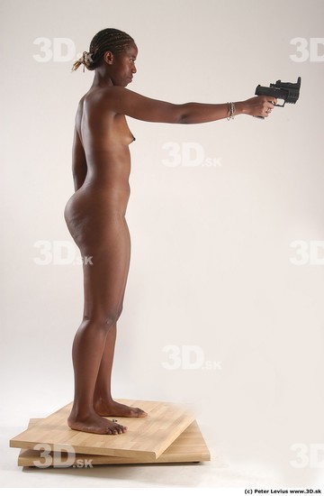 Whole Body Woman Pose with pistol Pose with sword Black Nude Athletic Studio photo references