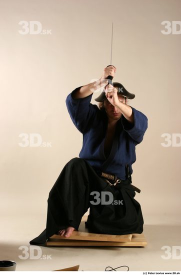 Whole Body Phonemes Man Pose with sword White Hairy Historical Average Male Studio Poses