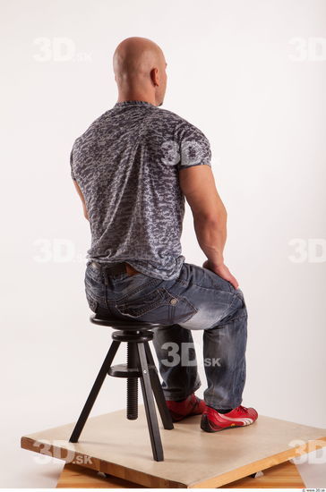 Sitting reference jeans tshirt of Sebastian