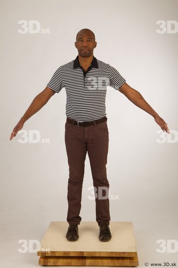 Whole body black white striped shirt brown jeans brown shoes of Arturo