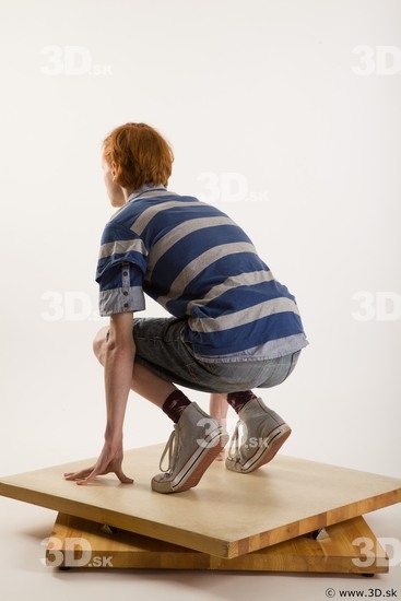 Kneeling reference of whole body striped blue gray shirt blue jeans shorts black gray shoes Wesley