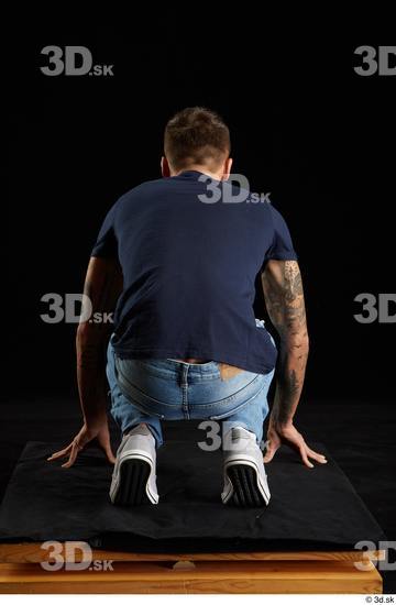 Whole Body Man White Shirt Jeans Athletic Kneeling Studio photo references