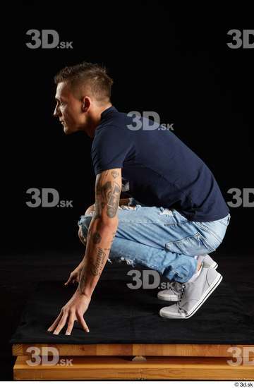 Whole Body Man White Shirt Jeans Athletic Kneeling Studio photo references