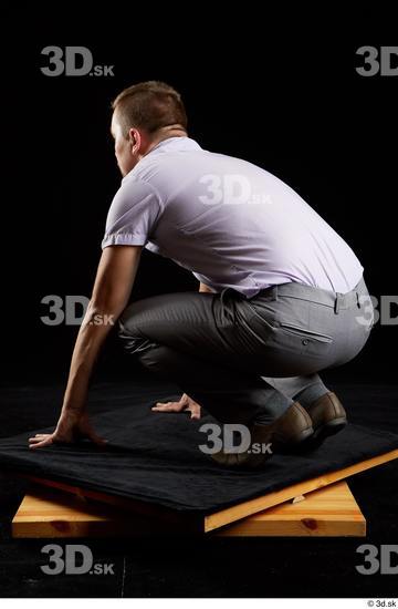 Whole Body Man White Shoes Shirt Trousers Average Kneeling Studio photo references