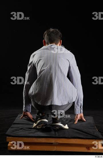 Whole Body Man White Casual Shoes Shirt Jeans Kneeling Studio photo references