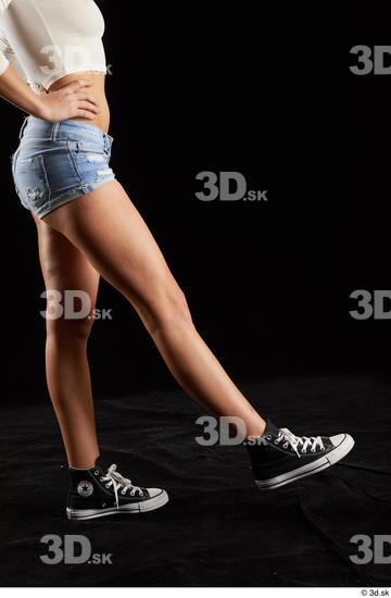 Katy Rose  black sneakers dressed flexing jeans shorts leg side view  jpg