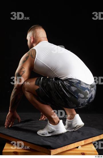 Whole Body Man White Sports Shorts Muscular Kneeling Top Studio photo references