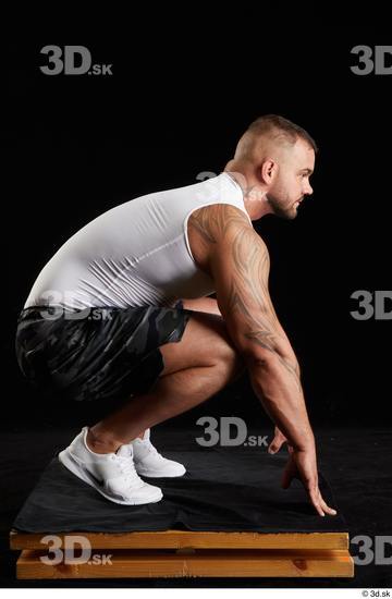 Whole Body Man White Sports Shorts Muscular Kneeling Top Studio photo references