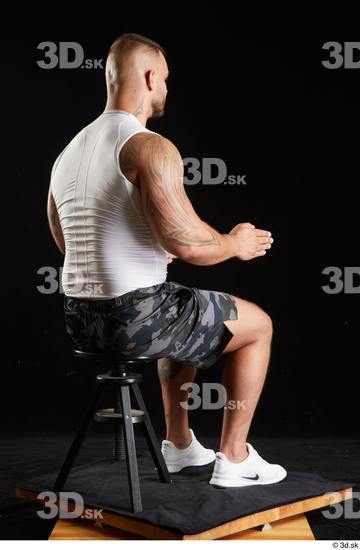 Whole Body Man White Sports Shorts Muscular Sitting Top Studio photo references