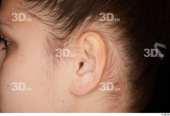 Serina Gomez ear  jpg