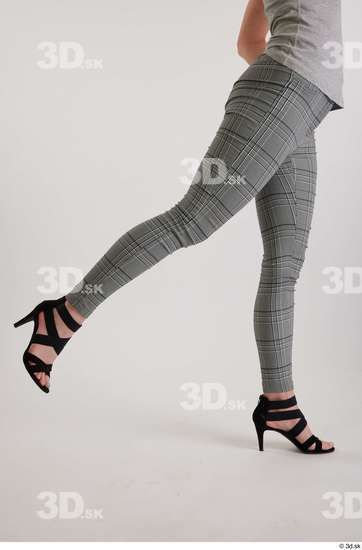 Olivia Sparkle  black high heels sandals casual dressed flexing grey checkered trousers leg side view  jpg