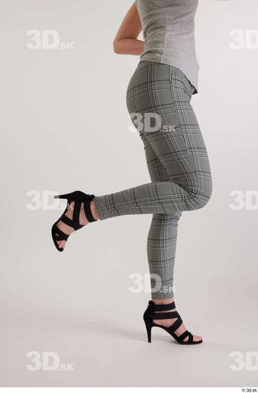 Olivia Sparkle  black high heels sandals casual dressed flexing grey checkered trousers leg side view  jpg