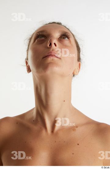 Front View Of The Neck And Upper Chest Of A Woman Photograph by