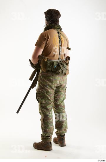 full length portrait of female wearing black tactical armour, crouching pose  holding a weapon, isolated on white studio background. Stock Photo | Adobe  Stock