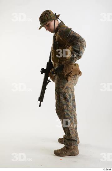 Whole Body Man Pose with machine rifle White Army Athletic Studio photo references