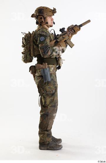 Whole Body Man Pose with machine rifle White Army Athletic Studio photo references