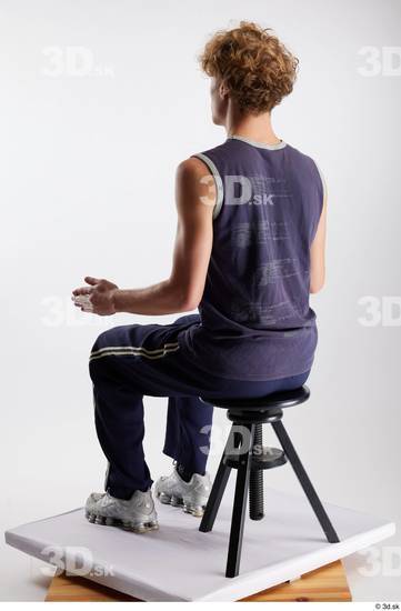 Whole Body Man White Sports Pants Slim Sitting Top Studio photo references