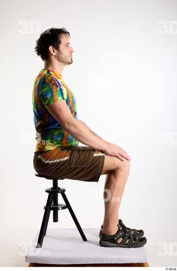 Whole Body Man White Casual Shorts Average Parrot Sitting Studio photo references