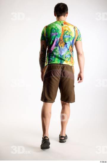 Whole Body Back Man White Casual Shorts Average Parrot Walking Studio photo references