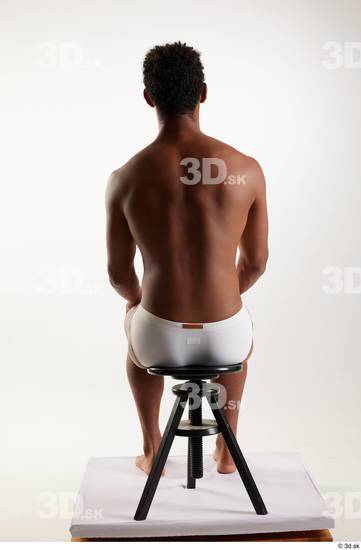 Whole Body Man Black Swimsuit Athletic Sitting Studio photo references