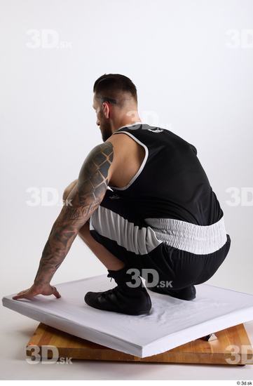 Whole Body Man White Sports Shorts Slim Athletic Kneeling Top Studio photo references