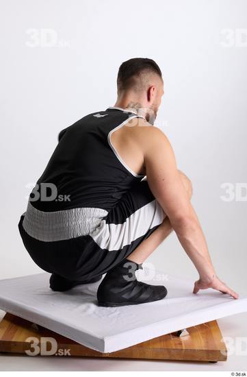 Whole Body Man White Sports Shorts Slim Athletic Kneeling Top Studio photo references