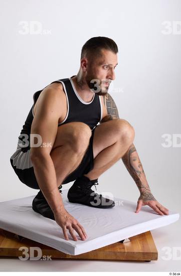 Whole Body Man White Sports Shorts Slim Athletic Kneeling Top Studio photo references